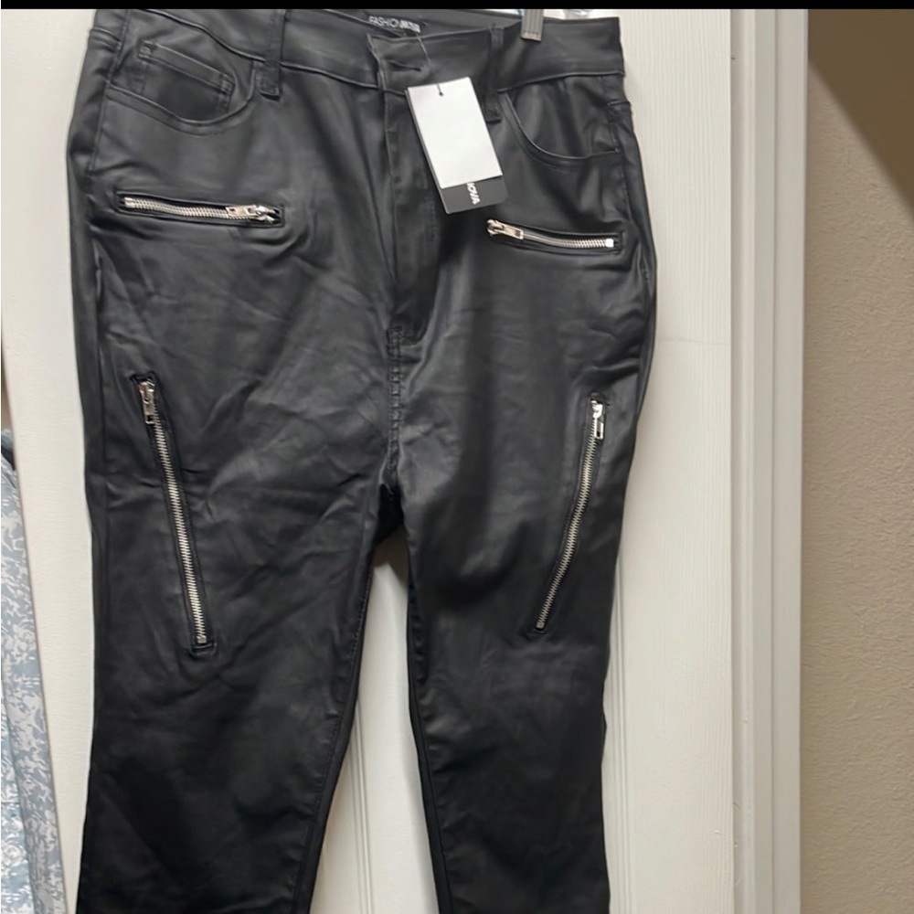 Black faux leather skinny pants